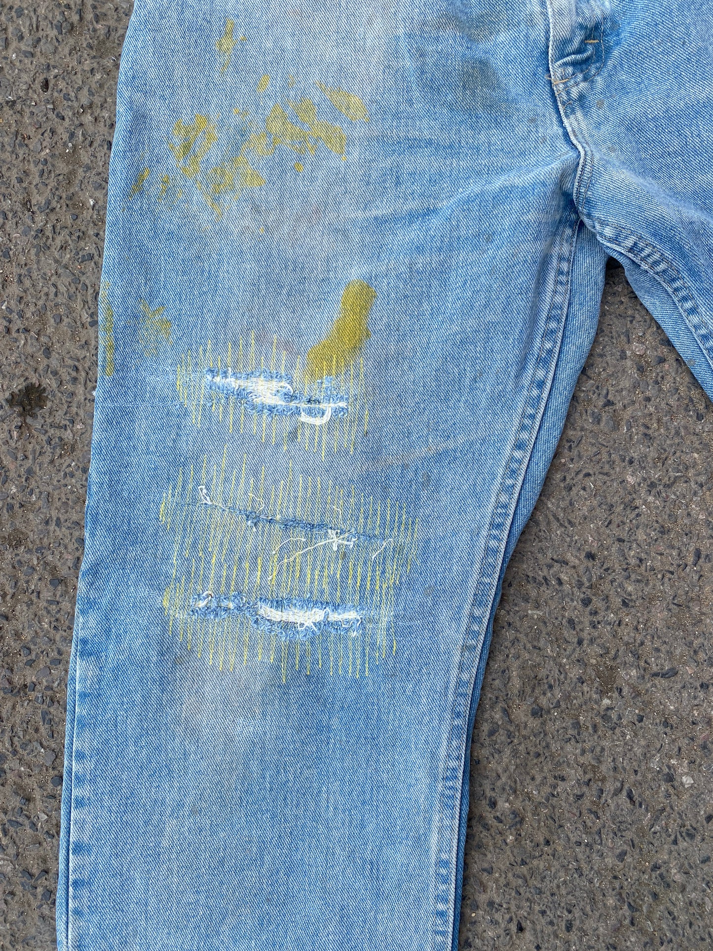 yellow mended vintge wrangler