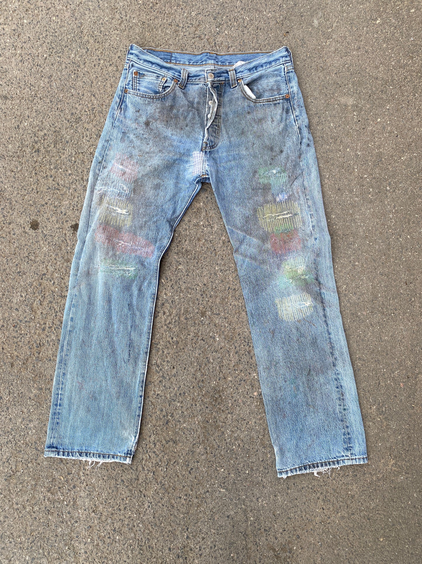 multicoloured mended vintage Levi’s
