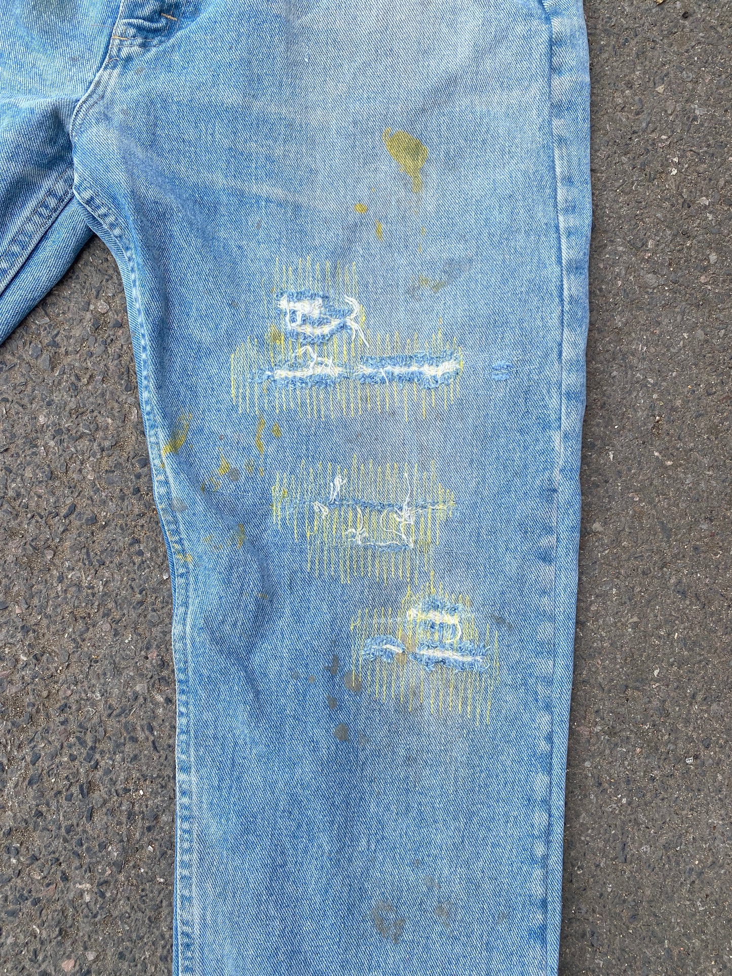 yellow mended vintge wrangler