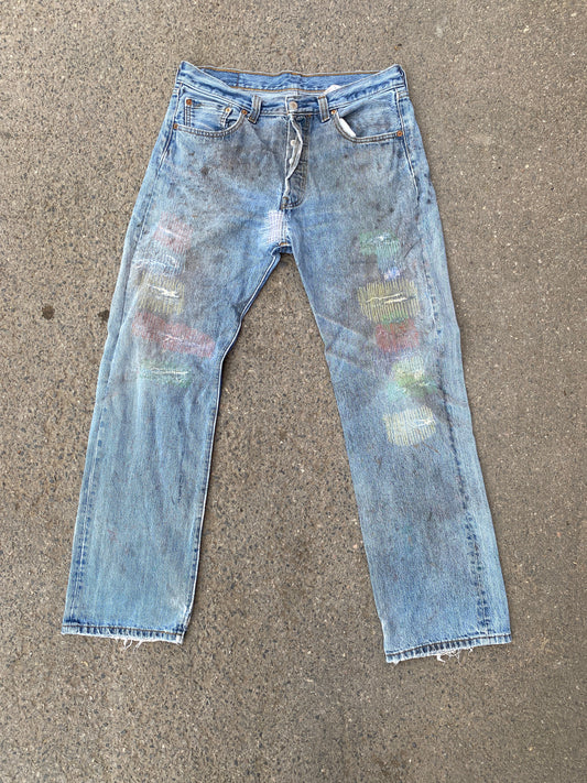 multicoloured mended vintage Levi’s