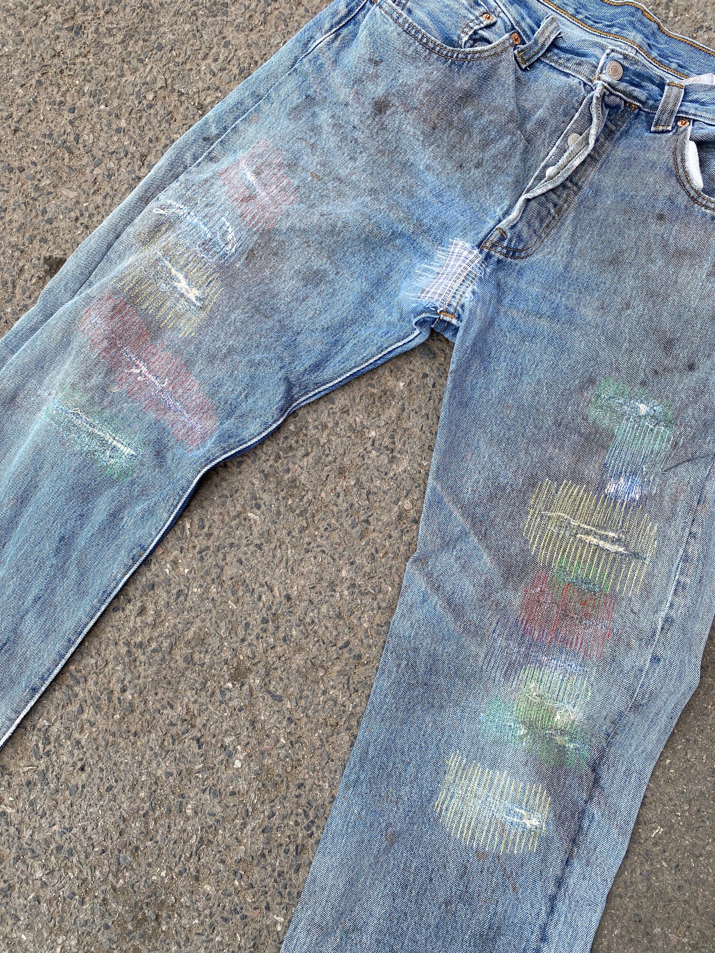 multicoloured mended vintage Levi’s