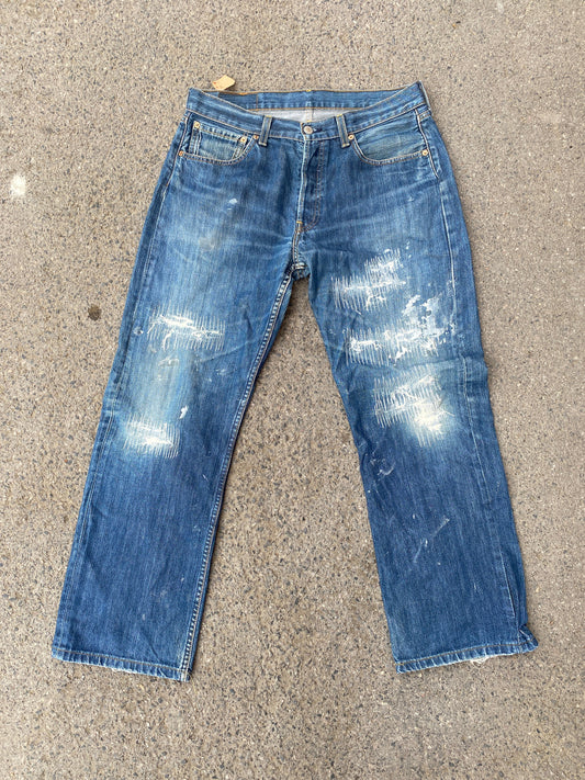 white mended vintage Levi’s