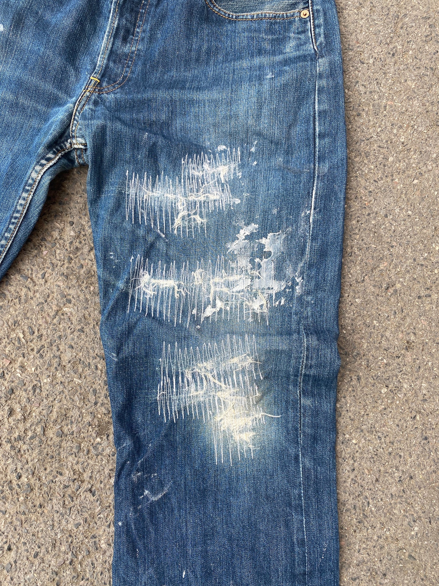 white mended vintage Levi’s