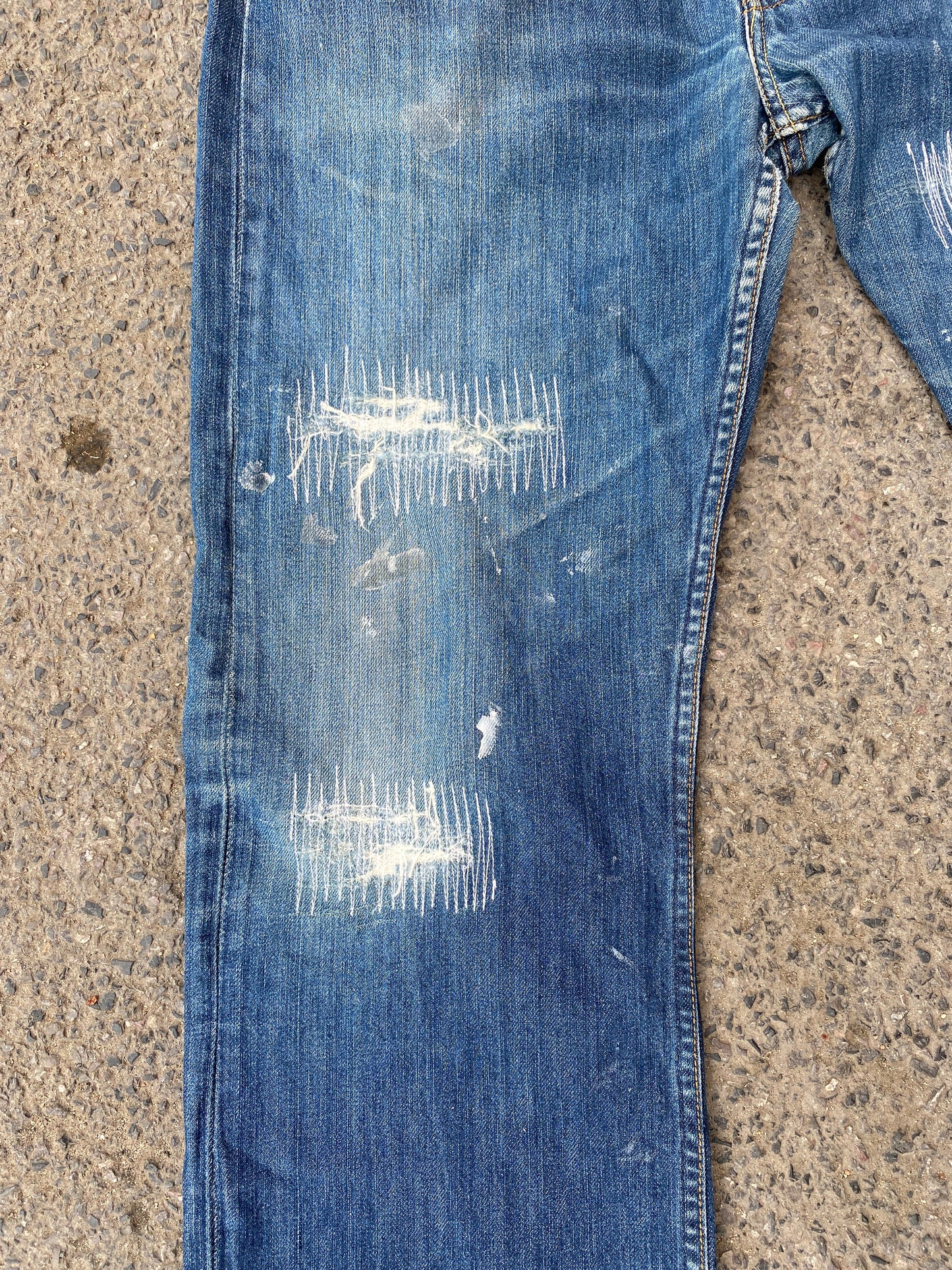 white mended vintage Levi’s
